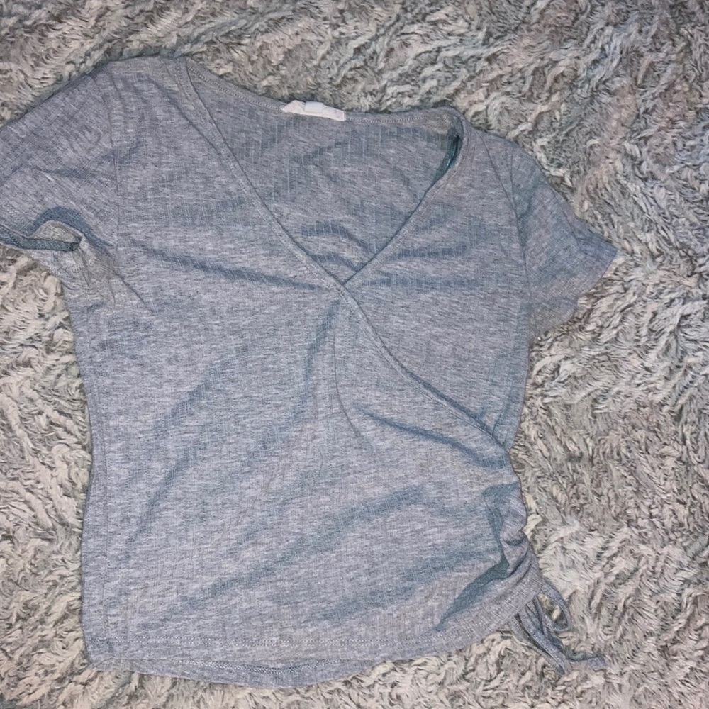 Size S brand is Pink Rose 60%polyester 35%rayon 5%spandex